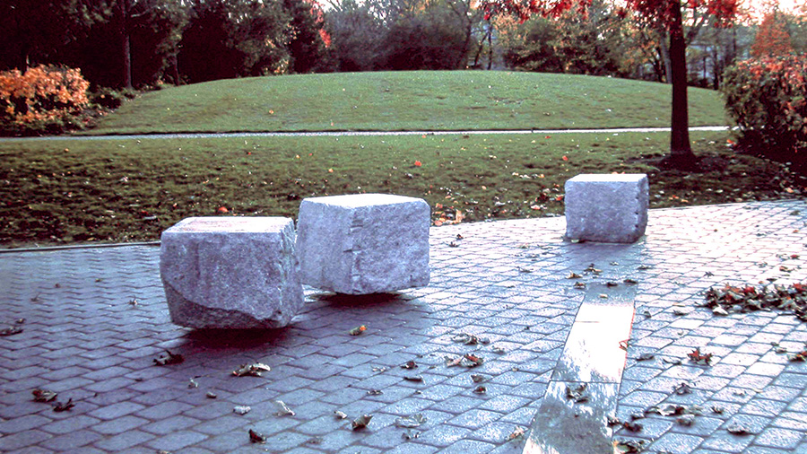 Floating Stones, 1992
Granite with elastomer inserts, plantings (River Birch, Pin Oaks, Red Twig Dogwood, Fragrant Sumac, Day Lilies), pavers, gravel.
Eleven 3' sq. blocks, 1800 sq. foot area.